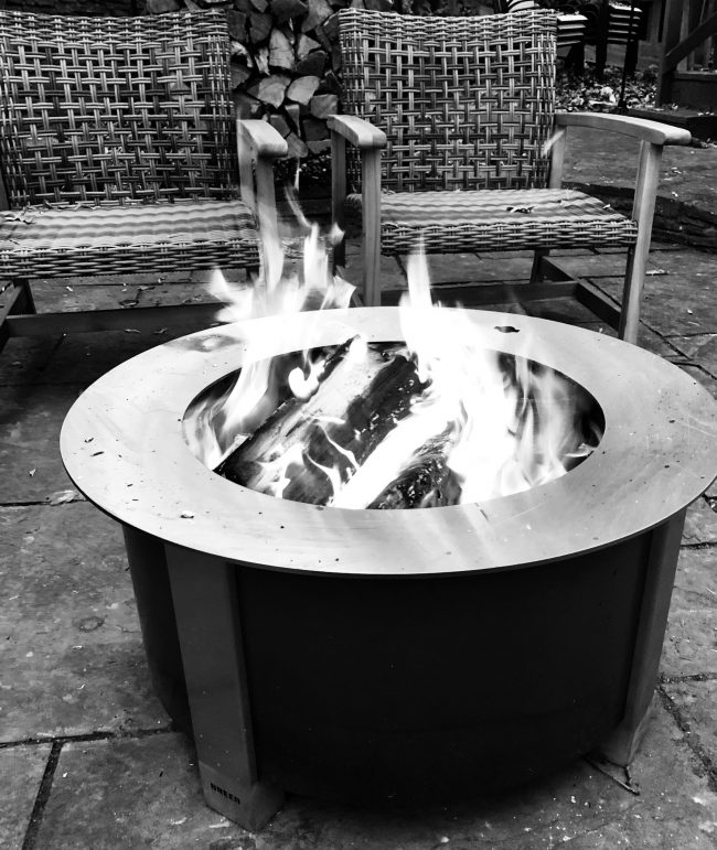 Black and white photo of a cozy fire pit